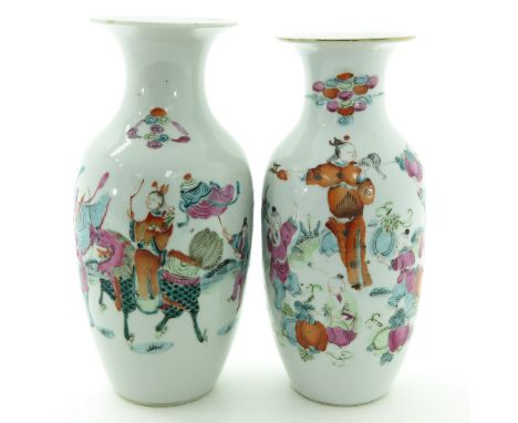 Depicting children playing in garden and Chinese men and women parading on horseback, Qing Dynasty, 24 cm. tall, one vase wit