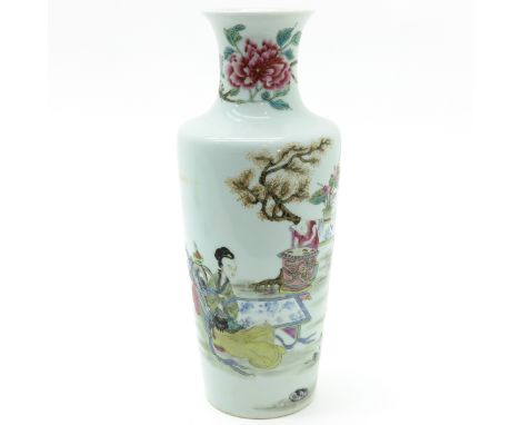 Depicting scene with Chinese woman and small children playing in garden, marked Yongzheng, 36 cm. tall.
