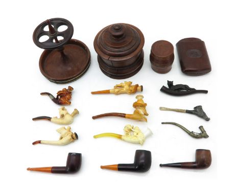 Sixteen items, including carved 12 pipes, pipe holders, and leather case.