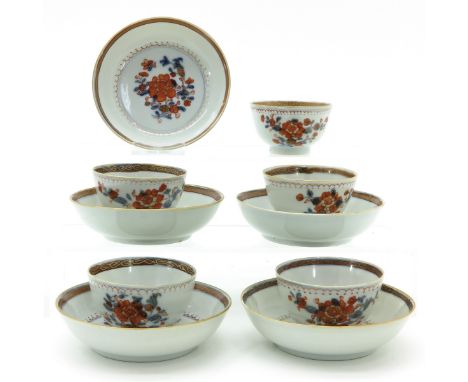 Floral design, saucers are 10 cm. in diameter.