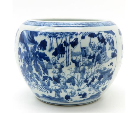 Depicting Chinese boys playing in garden, marked Kangxi, 24 cm. tall, crackle in glaze.