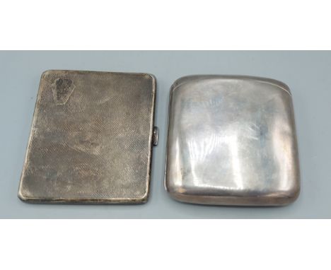 A Birmingham silver cigarette case of curved form together with another Birmingham silver cigarette case with engine turned d