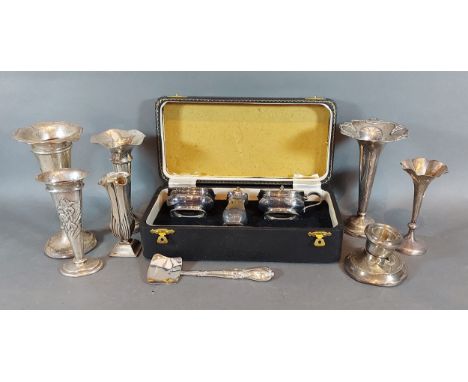 A Birmingham silver three piece condiment set within fitted case together with six silver spill vases, a silver dwarf candles