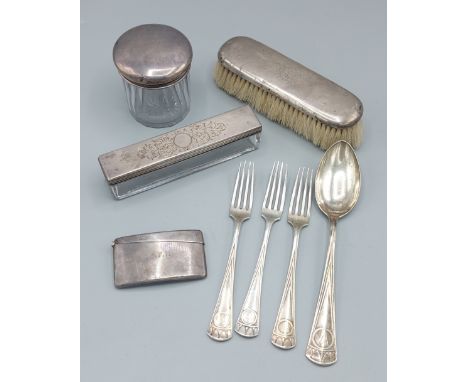 A set of three 800 mark forks together with a matching spoon, a Birmingham silver card case and three silver topped dressing 