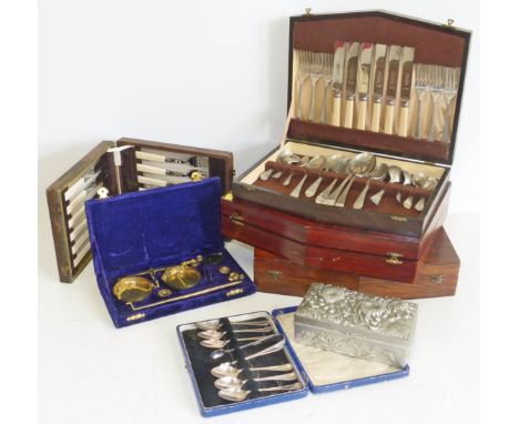 Various canteens of cutlery and cased set of scales. Condition reports are not available for our Interiors Sale.