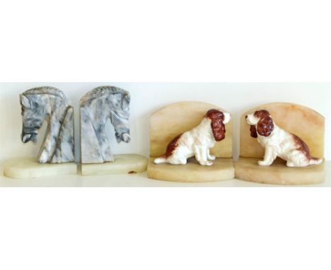 Two pairs of marble bookend, one in the form of horses heads and the other surmounted by ceramic spaniel Condition reports ar