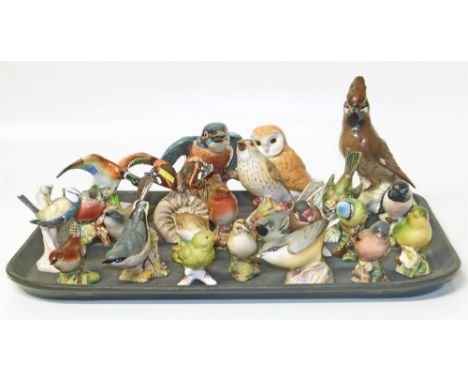 Fourteen Beswick birds, two Royal&nbsp; Worcester birds, Aynsley snipe, four Goebel birds, a butterfly and a Royal Doulton ma