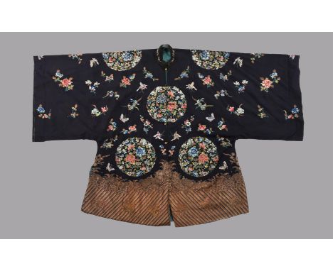 A Chinese robe worn by a wealthy Han clans-women, Qing Dynasty, 19th century, circa 1870, probably a wife of a Mandarin, with