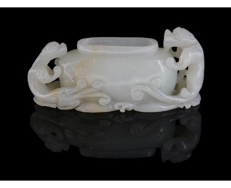 A Chinese celadon jade waterpot, 19th or 20th century, carved on both sides with two chilong dragons, 9.4cm long青玉螭龙水呈Conditi