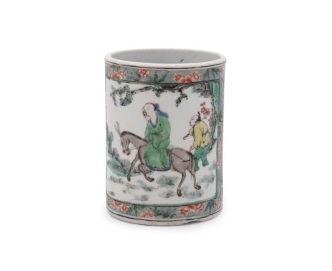 A Chinese Famille Verte cylindrical brush pot, Kangxi, painted on one side with a Daoist scholar on a mule, probably Zhang Gu