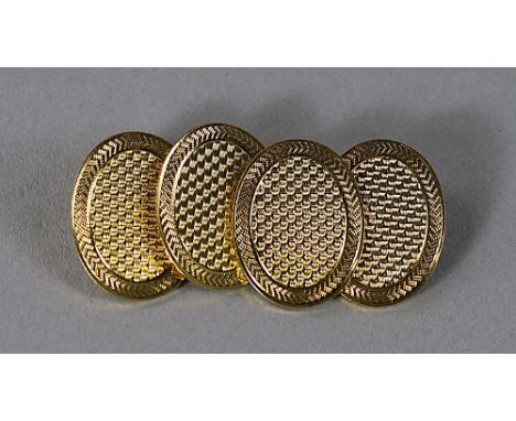 A pair of 18ct gold gentleman's cufflinks, Birmingham 1934, maker C&F, of oval form, with engine turned decoration, approx 20