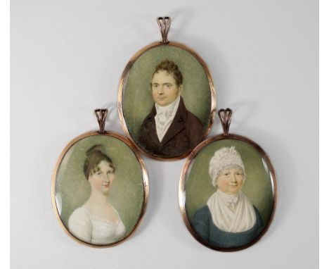 A Group of Three Portrait Miniatures, British School, early 19th century, depicting John Smith, half-length in a brown coat a