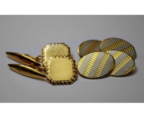 A pair of 18ct gold an platinum bi-colour gentleman's cufflinks, Birmingham 1930, of oval form with engine turned decoration,