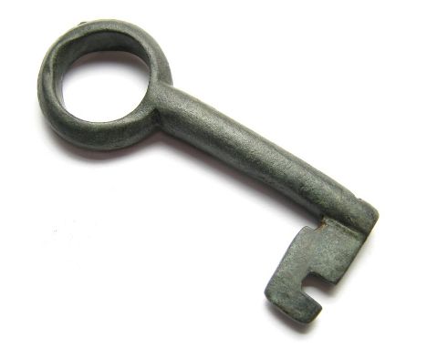 Medieval Bronze Key. Circa 14th - 15th century AD. Size, 62.38 mm. A cast bronze key with a plain circular bow and shank. The