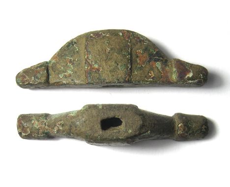Anglo-Saxon Pommel. Circa 7th-8th century AD, 53.20 mm. A copper-alloy pommel fitting of the cocked hat type, plain with no d