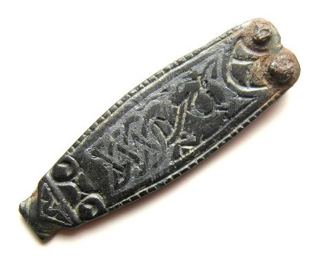 Anglo-Saxon Strap-End.   Circa 10th century AD. Size: 40.82 mm. A quality zoomorphic strap-end detailed with a large panel of