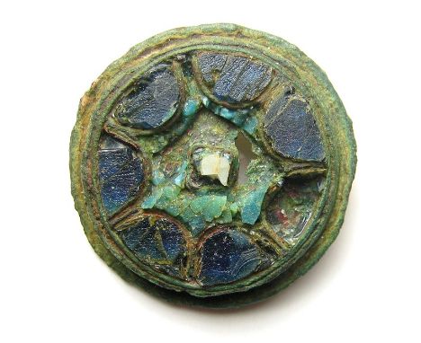 Anglo-Scandinavian Cloisonne Brooch.   Circa 10th century AD. Size: 22.91 mm. A copper-alloy disc brooch decorated with blue,