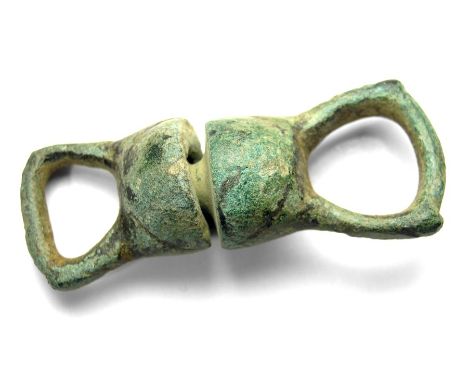 Medieval Bronze Leash Swivel.  Circa 15th - 16th century. Size: 47.01 mm. A leash swivel formed of two tapering rectangular l