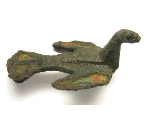 Roman Bird Brooch.  Circa 2nd century AD. Copper-alloy, 5.28 grams. Size: 33.69 mm. A plate brooch in the form of a bird in f