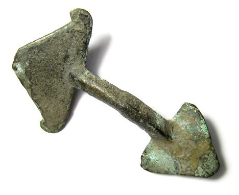 Anglo-Saxon Brooch. Copper-alloy, 8.58 grams. 56.16 mm. Circa 5th century AD. A bow brooch with triangular head plate, flat a