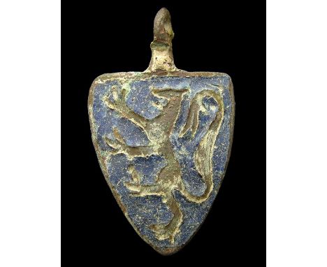 Medieval Harness Pendant  Circa, 13th century AD. Copper-alloy, 7.4 grams. 36mm. A shield shaped horse harness pendant displa