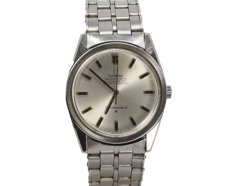 A stainless steel Omega Constellation automatic bracelet watch,  33mm tonneau form case, with a silvered dial, applied gilt b
