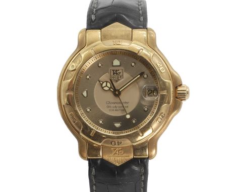 An 18ct gold Tag Heuer 6000 automatic strap watch,  ref. WH524, 36mm case, with a champagne dial, applied luminous filled dot