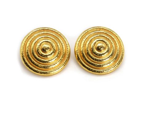 A pair of 18ct gold disc shaped ear clips, by Lalaounis, of concentric circle design, with a light hammer finish, to clip fit