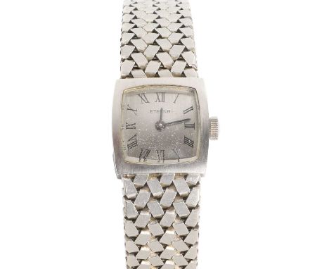 A ladies' 18ct white gold Eterna mechanical bracelet watch, 17mm case, with a silvered dial, black Roman numerals, blued penc