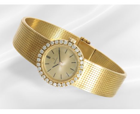 Armbanduhr: goldene vintage Damenuhr der Marke Omega mit Brillantbesatz, ca. 0,6ct,18K Gelbgold: Ca. Ø22mm, ca. 45,7g, 18K Ge