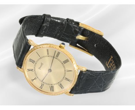 Armbanduhr: ultraflache, goldene Piaget Herren/Damen-Armbanduhr, Ref: 9016, 18K Gold am Lederband: Ca. Ø 27mm, extra flaches 