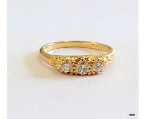 An 18ct gold 3 stone diamond ring approx 0.60 ct size N