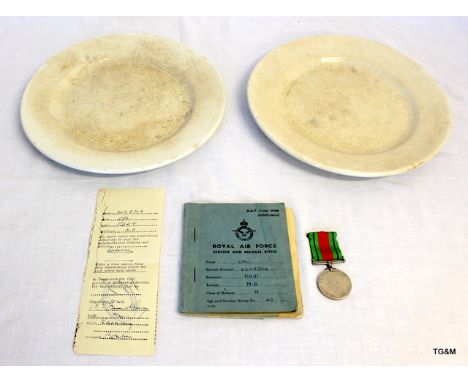 Two 1942 dated Royal Air Force ceramic plates a Defence Medal  and RAF service & Release Book named to Corporal Marjorie Peat