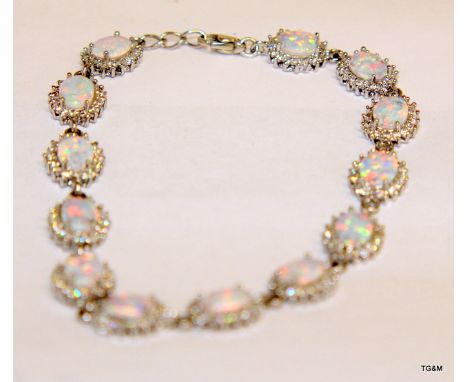 A Silver And Opal Bracelet