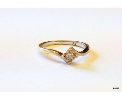 A 9ct white gold ladies diamond crossover ring size N 