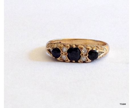 A 9ct gold Diamond and sapphire old set ring Size N