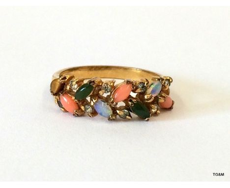 A coral and other stone ring