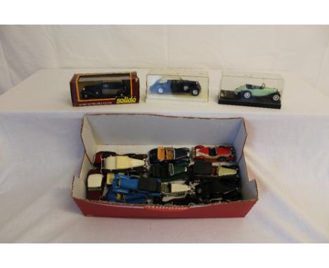 A box of 15 model vintage cars