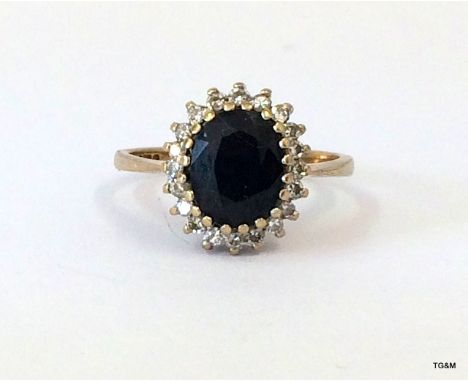 9ct gold diamond and sapphire cluster ring size N