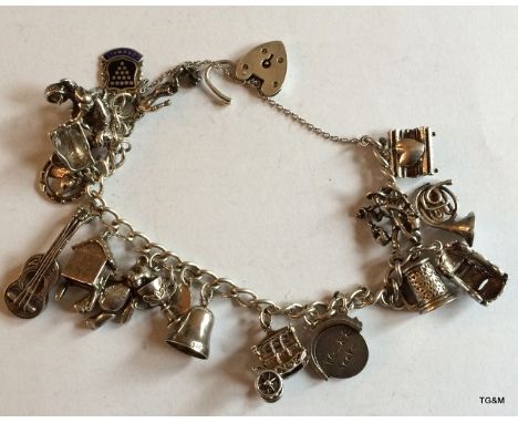 Silver Charm Bracelet & 18 Charms