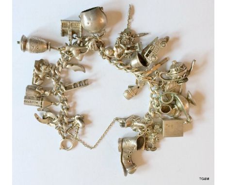 Silver Charm Bracelet & 23 Charms