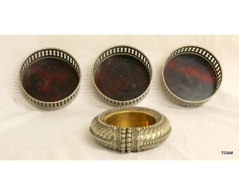 Three Silver Plated Faux Tortoise shell Wine Coaster, A White Metal Slave Bangle Wine Coaster