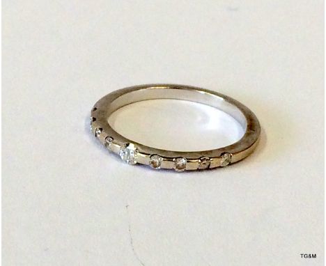 White gold and diamond 1/2 eternity ring size N