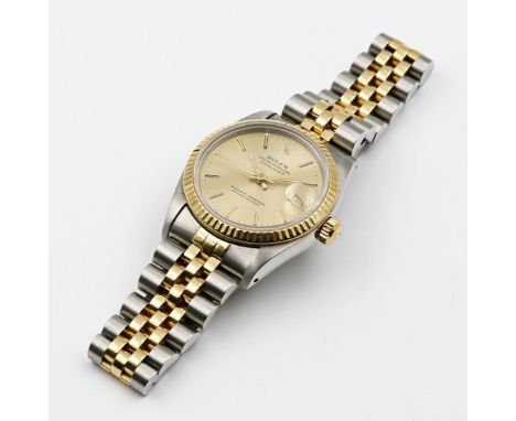 Mediumarmbanduhr "ROLEX Oyster Perpetual Datejust". Chronometer in Stahl und 18 kt. GG. Matt vergoldetes Zifferblatt mit aufg