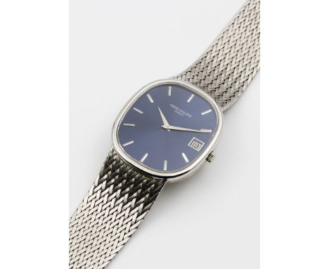 Herrenarmbanduhr "Ellipse Jumbo", Patek Philippe. 750/000 WG-Gehäuse und -Armband, brutto 114 g. Blaues Zifferblatt mit Stric