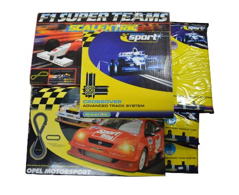 Scalextrics slot car toy sets, including ref. C762 F1 super teams; ref.C1069 Opel Motorsport, both complete with two vehicles