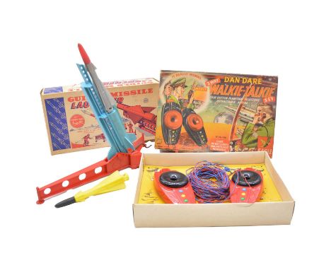 Dan Dare walkie talkie set, red, boxed with decoder in base; Marx &amp; co. Guided missile launcher, two projectiles, operati