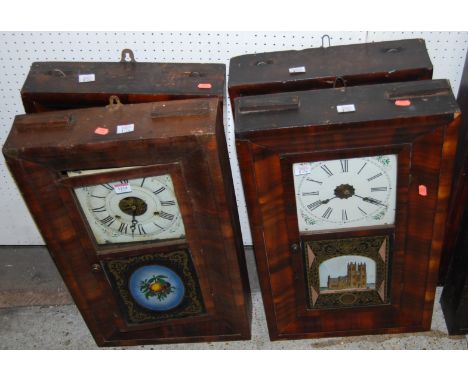 Four various early 20th century American mahogany drop trunk wall clocks