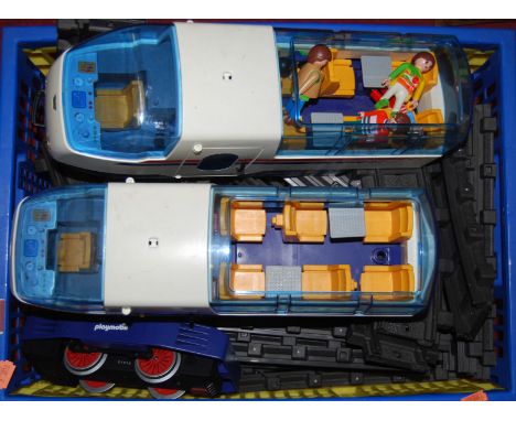 A quantity of Playmobil G-scale locomotives, accessories and track