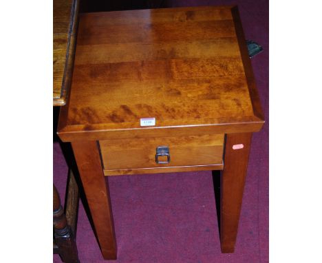 A contemporary hardwood low single drawer lamp table, width 45cm